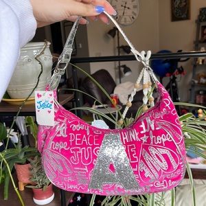Justice monogram purse. NWT